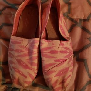 Pink and white TOMS